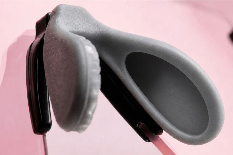 A microscopic macro photograph revealing the internal air bag and chamber structure of Revoray's pneumatic silicone air cushion nose pad technology.